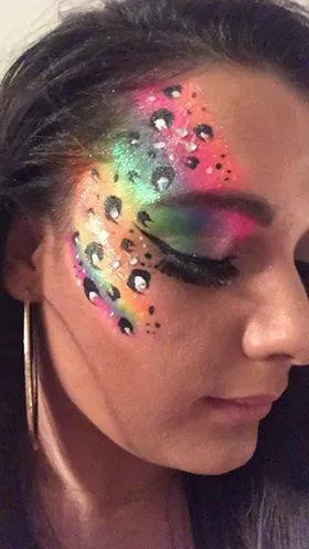 Festival glitter and gems painted around the eye