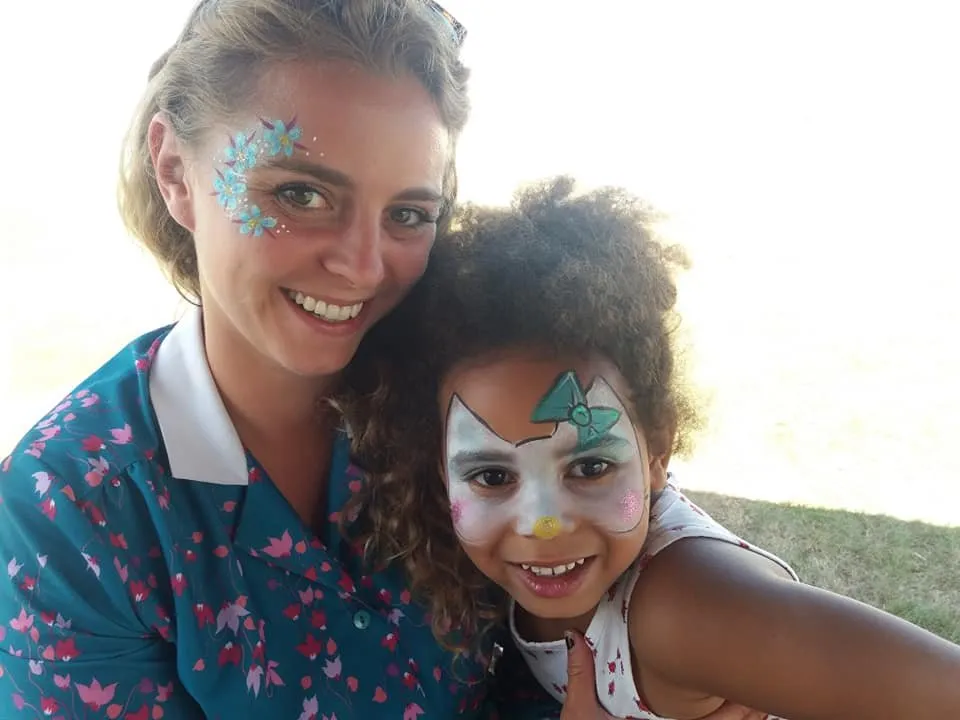 A mum and daughter with matching sparkly designs