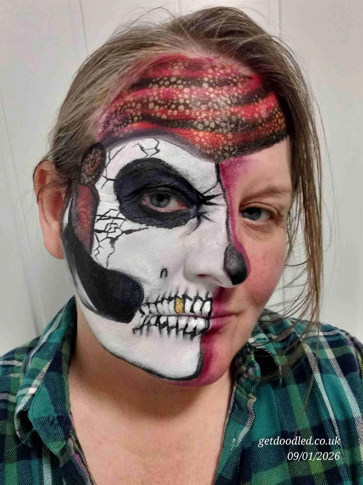 A half skull, half pirate face design